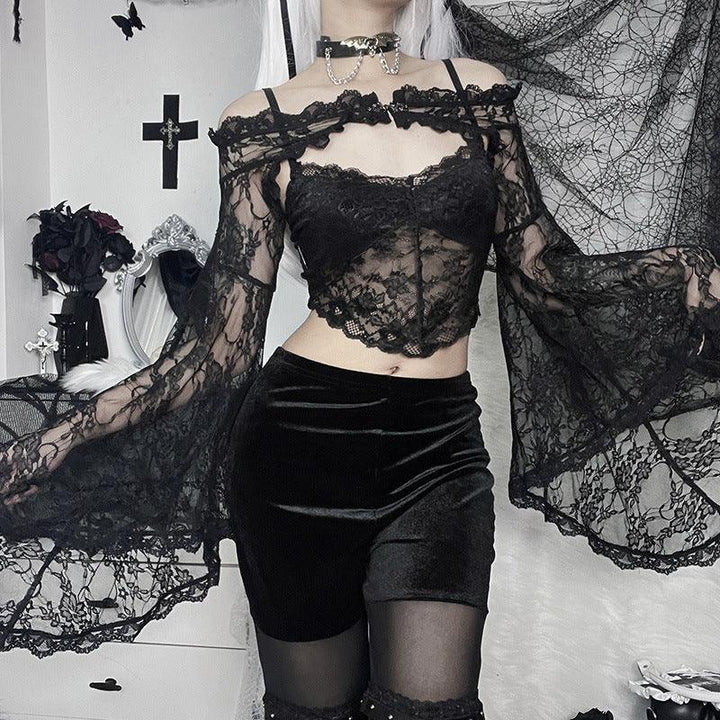 a woman wear a black gothic lace mesh long sleeve top blouse