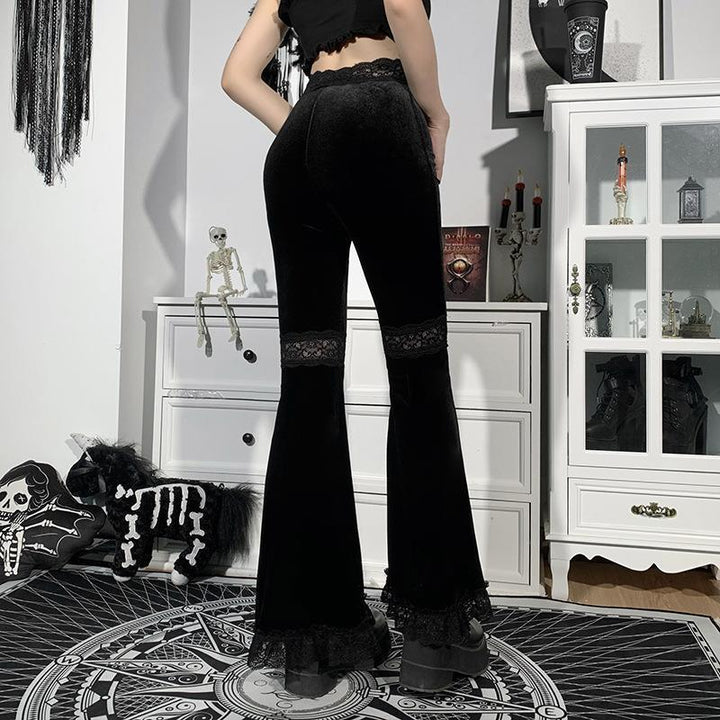 a woman wear a black gothic punk lace panel flare pant