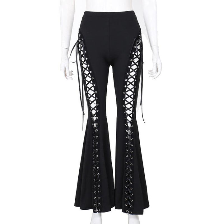 a woman wear a black gothic punk street fashion pant