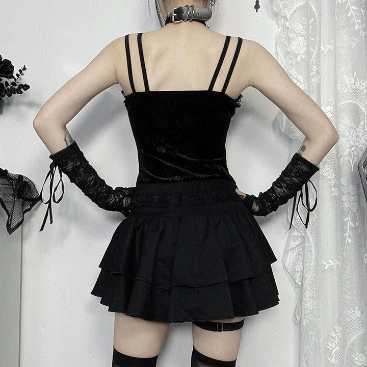 a woman wear a black gothic rose lace camisole top