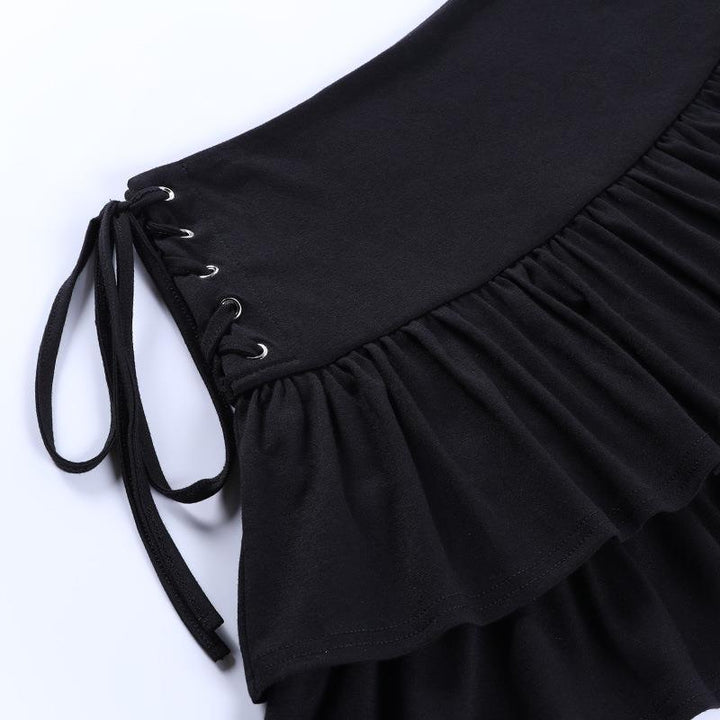 details of a black gothic ruffled edge half body dress