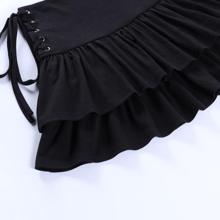 details of a black gothic ruffled edge half body dress