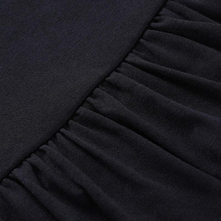 details of a black gothic ruffled edge half body dress