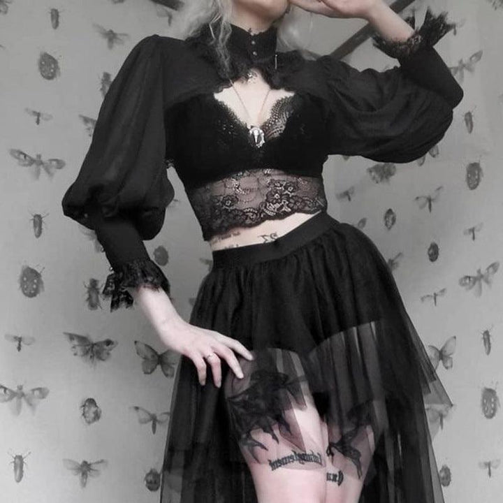 a woman wear a black gothic victorian lace high neck blouse