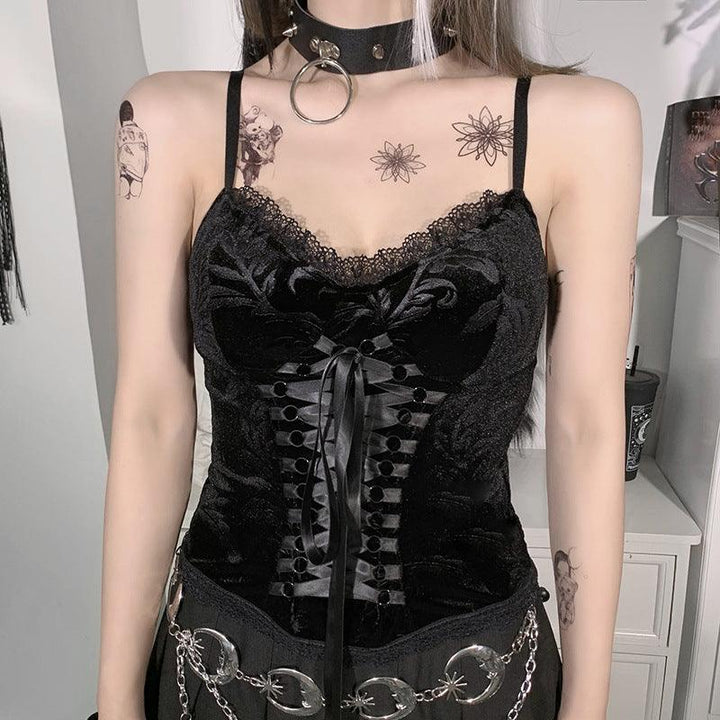 a woman wear a black gothic vintage lace trim cami top