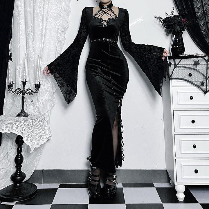 a woman wear a black long sleeve gothic lace velvet dress