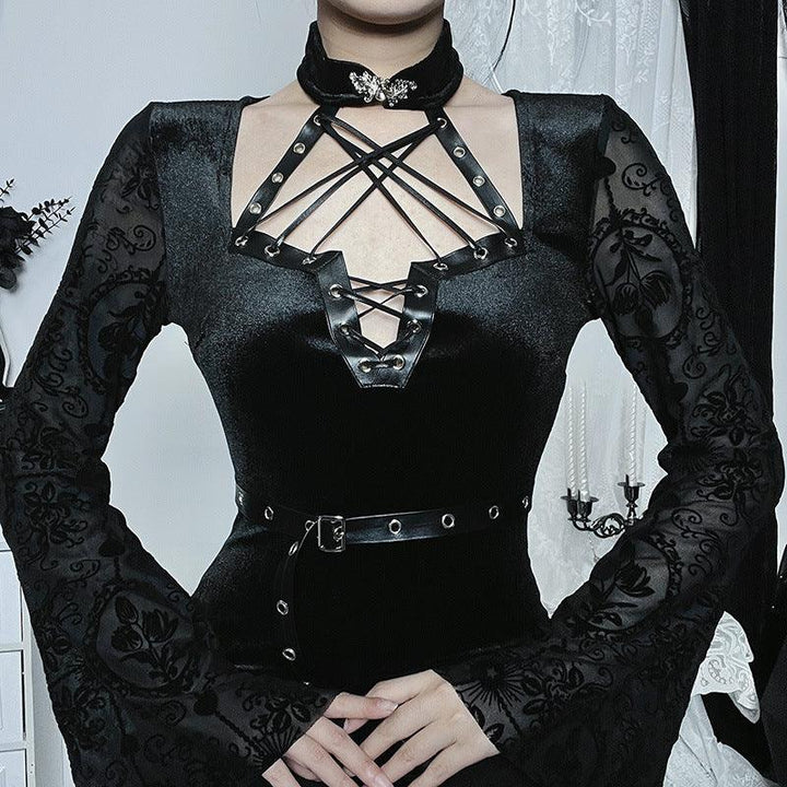 a woman wear a black long sleeve gothic lace velvet dress