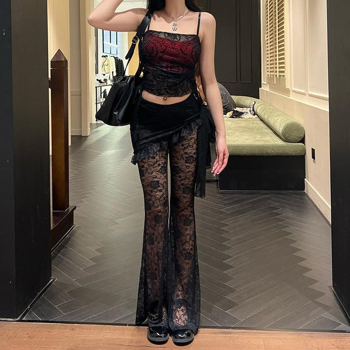 a woman wear a black red sexy gothic outfit long pant