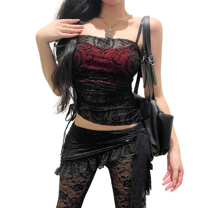 a woman wear black red sexy gothic outfit sleeveless shirts and long pant