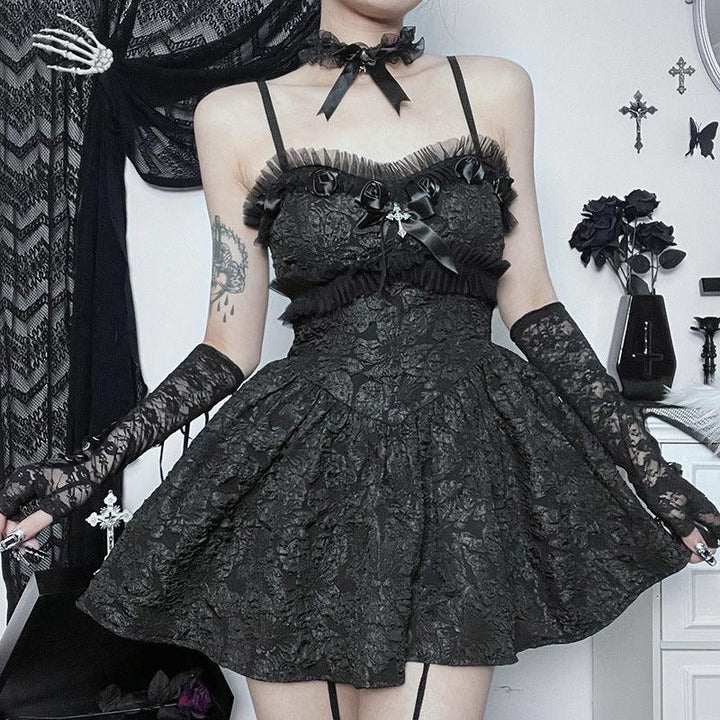 a woman wear a black sleeveless gothic lace short dress