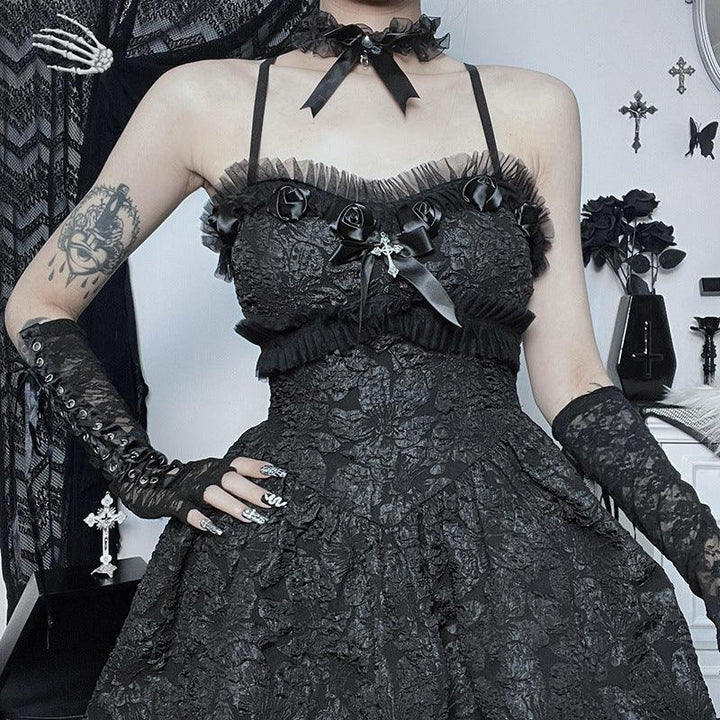 a woman wear a black sleeveless gothic lace short dress