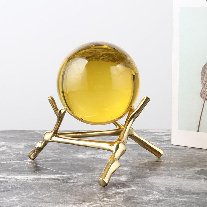 details of brass base crystal ball ornament office desk decoration