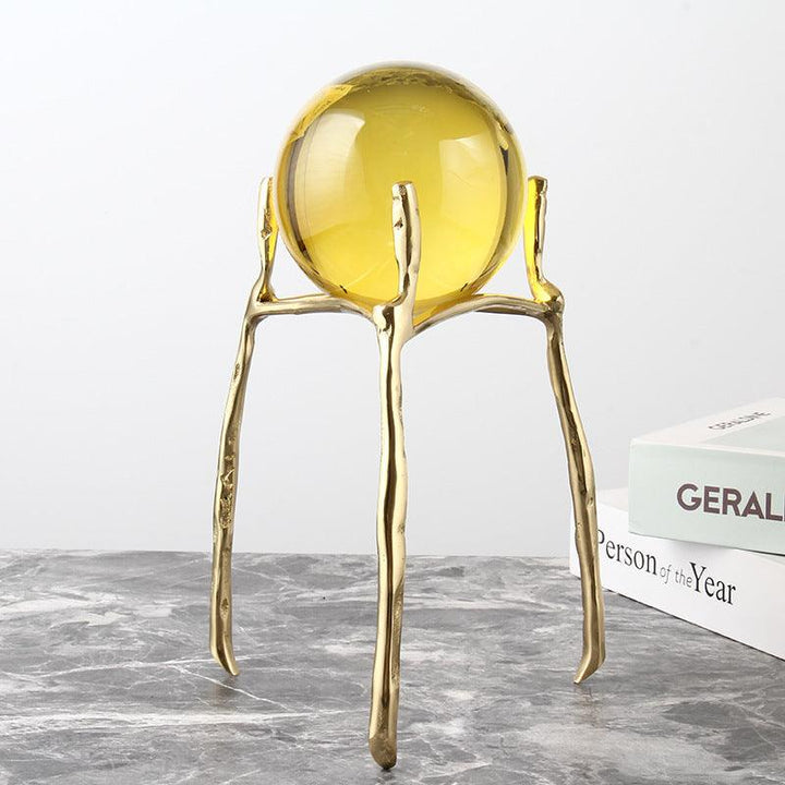 details of brass base crystal ball ornament office desk decoration