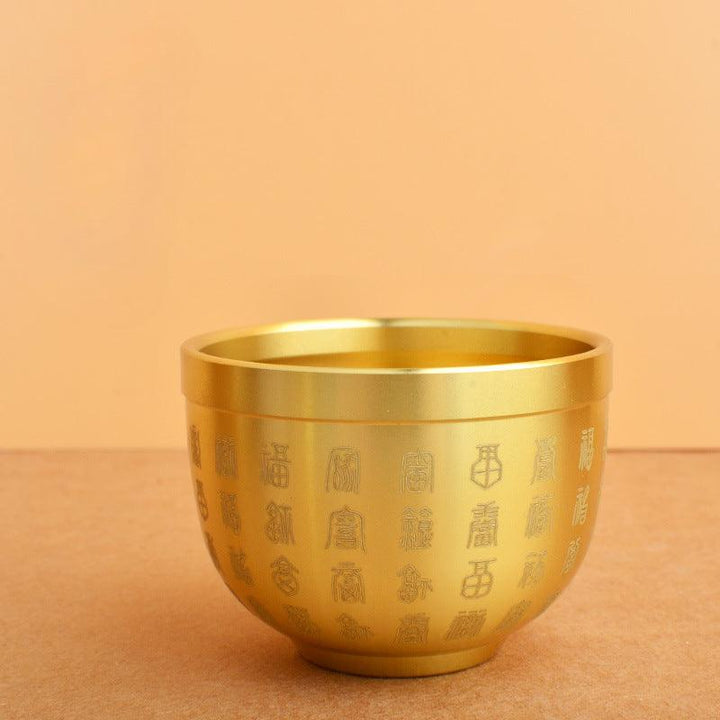 details of brass wealth treasure bowl ornament with five elements crystal stones