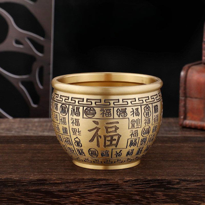 details of brass wealth treasure bowl ornament with five elements crystal stones