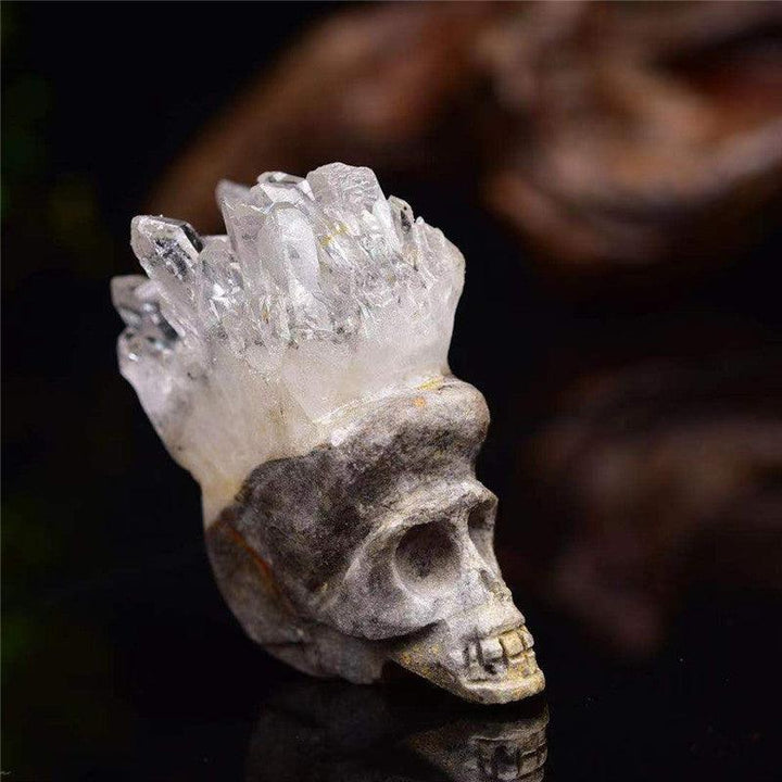 clear crystal cluster skull and bones ornament on the table