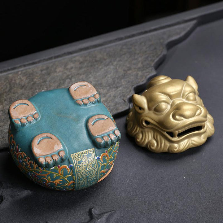 details of colorful mythical animal in enamel incense burner holder