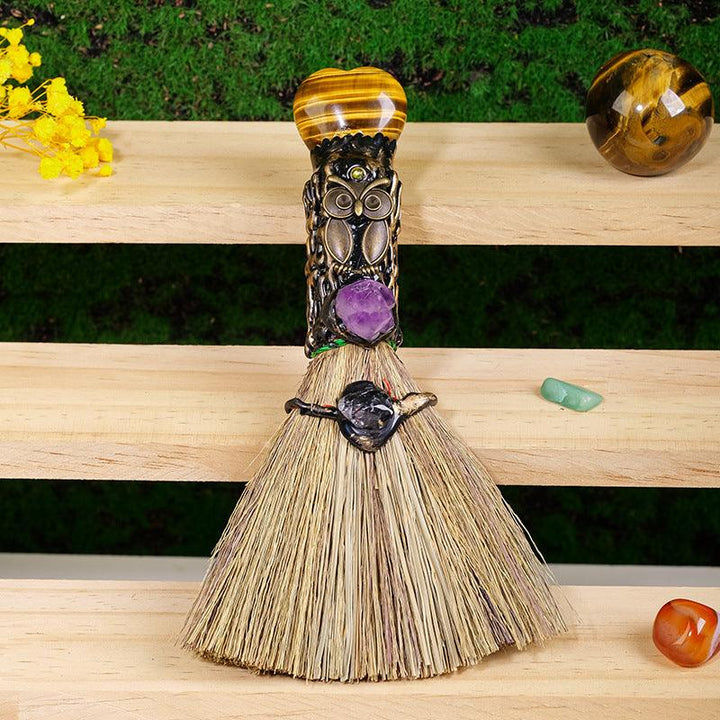 details of crystal magic broom raw stone heart shaped witchcrafts broom