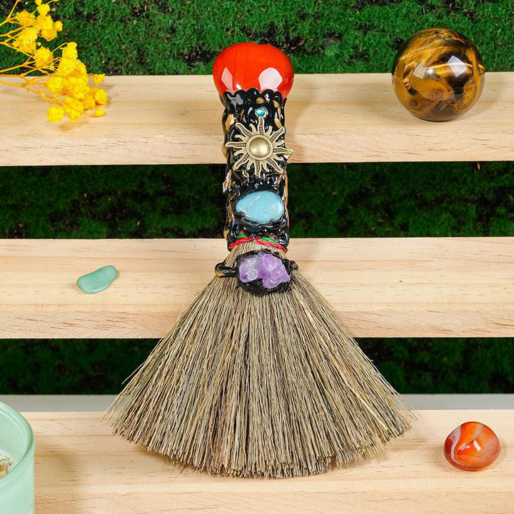 details of crystal magic broom raw stone heart shaped witchcrafts broom