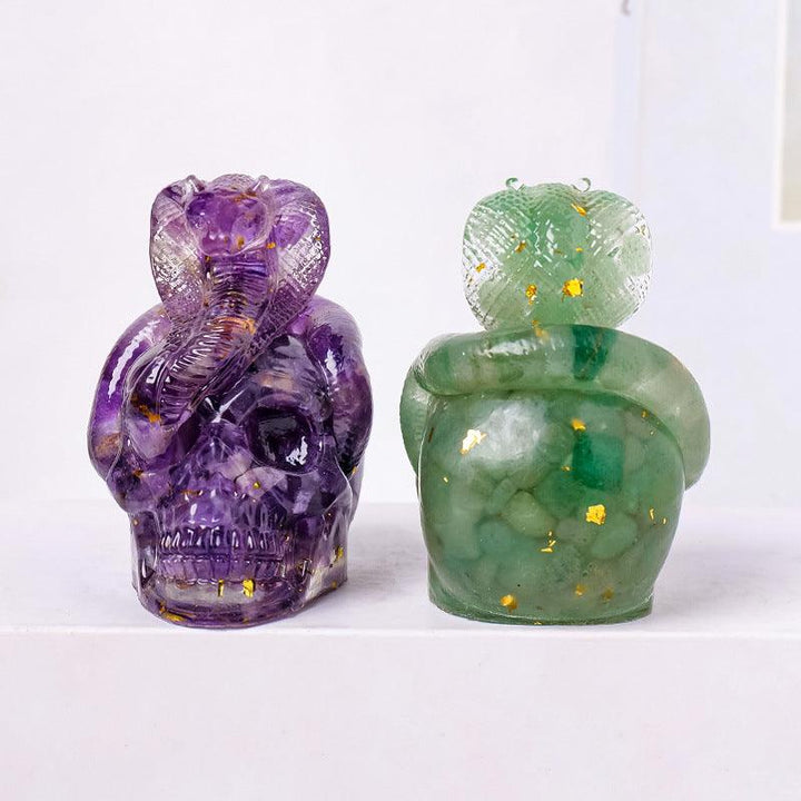 two crystal snake wrapped skull resin ornament