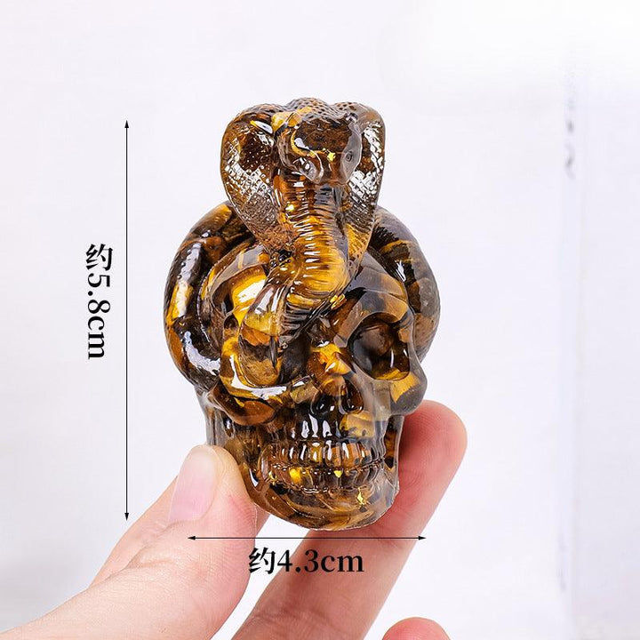 size of crystal snake wrapped skull resin ornament