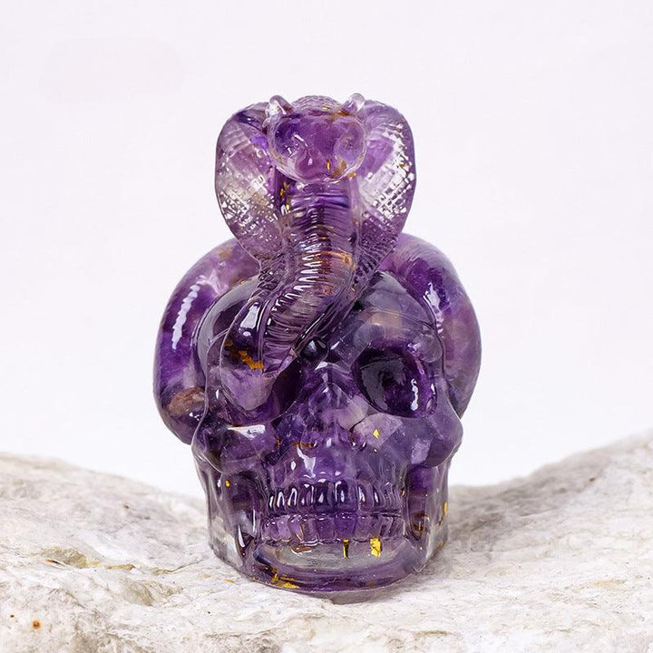 amethyst crystal snake wrapped skull resin ornament