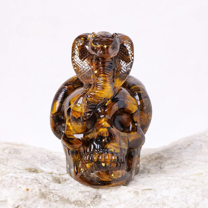 Tiger’s Eye crystal snake wrapped skull resin ornament