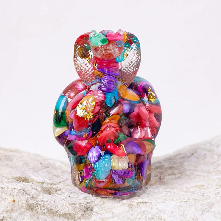 rainbow crystal snake wrapped skull resin ornament