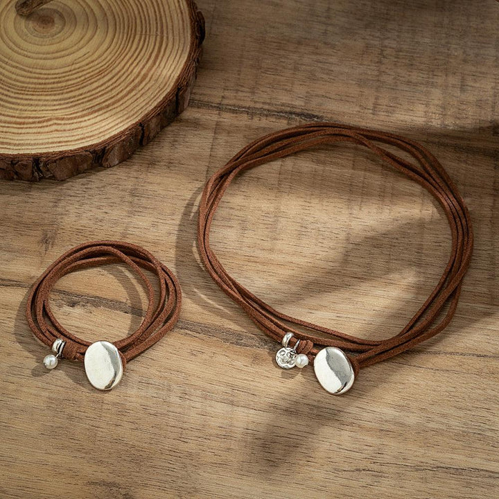 a brown double layer wrap bracelet and necklace