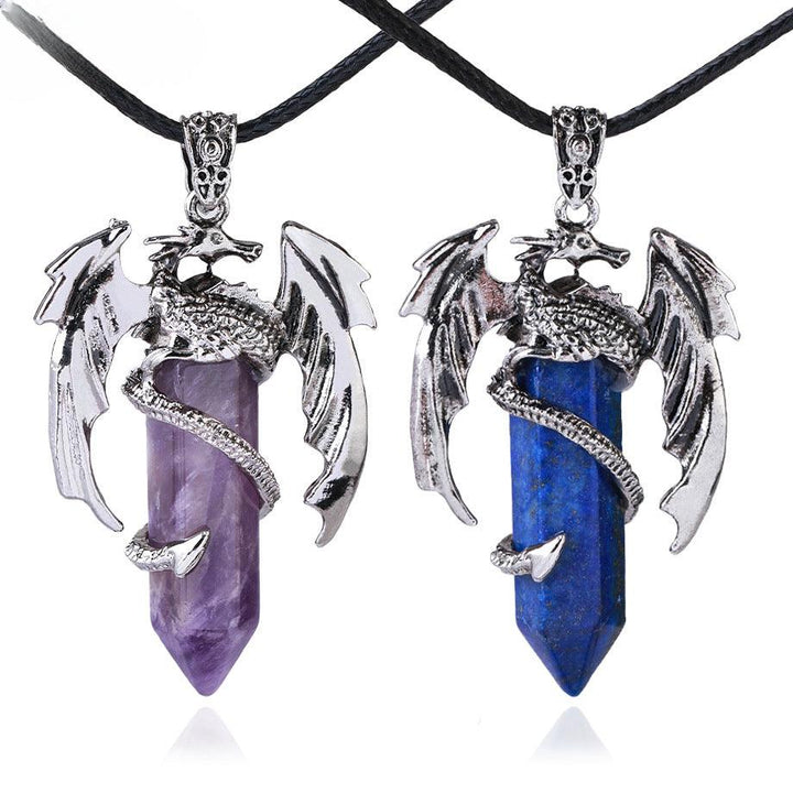 dragon shaped crystal stone pendant spirit pendulum pendant on the table