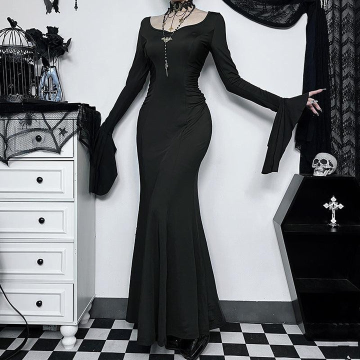 a woman wear the adams family fishtail goth long dress