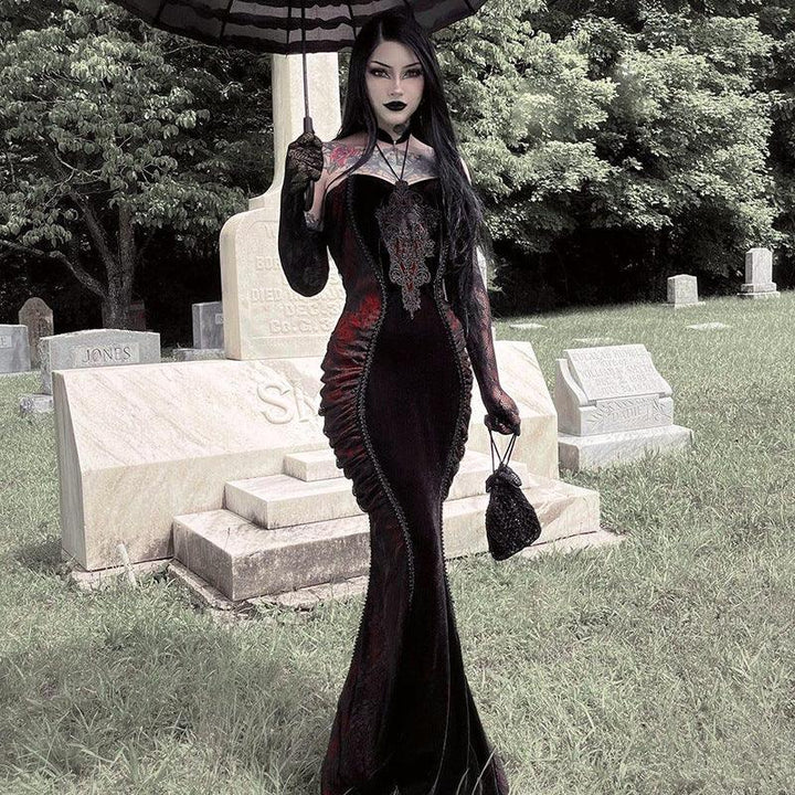 a woman wear a gothic black and red sexy fitted mermaid hem dress