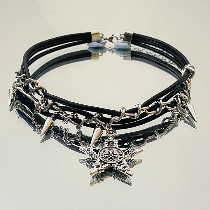 a gothic black leather buckle star choker