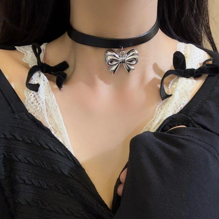 a gothic black leather buckle bow tie choker