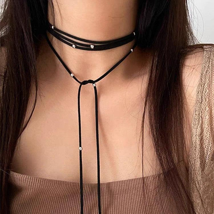 a gothic black leather buckle long leather choker