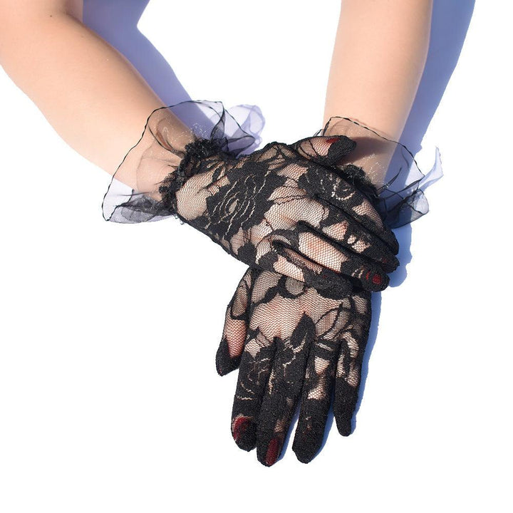 a woman wear gothic elegant rose lace mesh short gloves