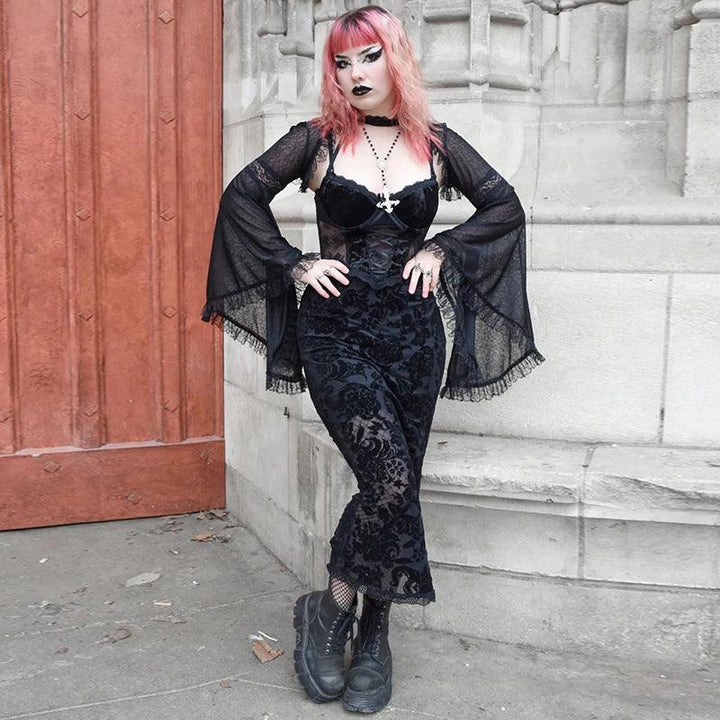 a woman wear a gothic lace flared long sleeve casual black shawl