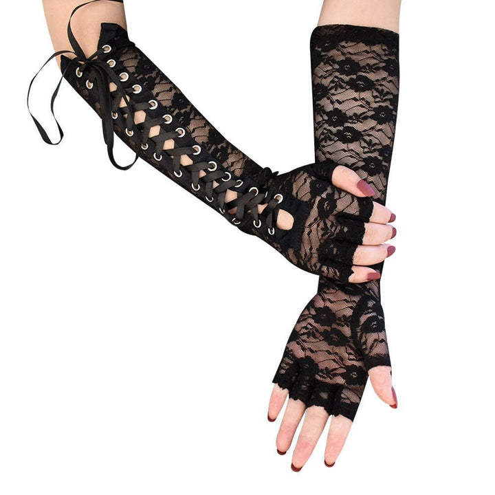 a woman wear gothic lolita lace black strap half finger gloves