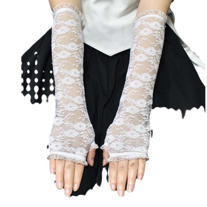 a woman wear gothic wedding white lace fingerless gloves