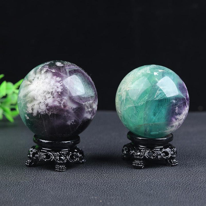 green phantom crystal ball energy gemstone statues on the table