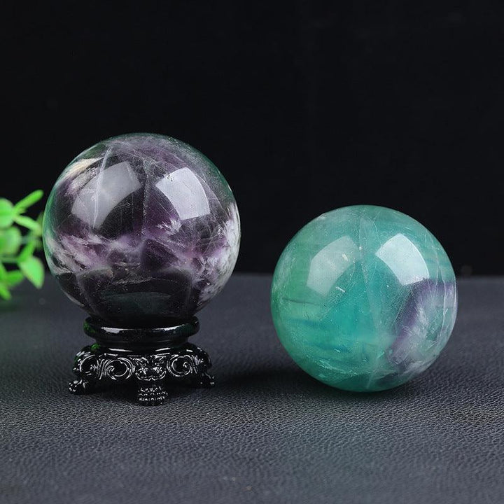 details of green phantom crystal ball energy gemstone statues