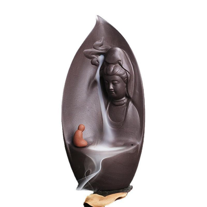 guanyin and buddhist monk reversing incense burner holder