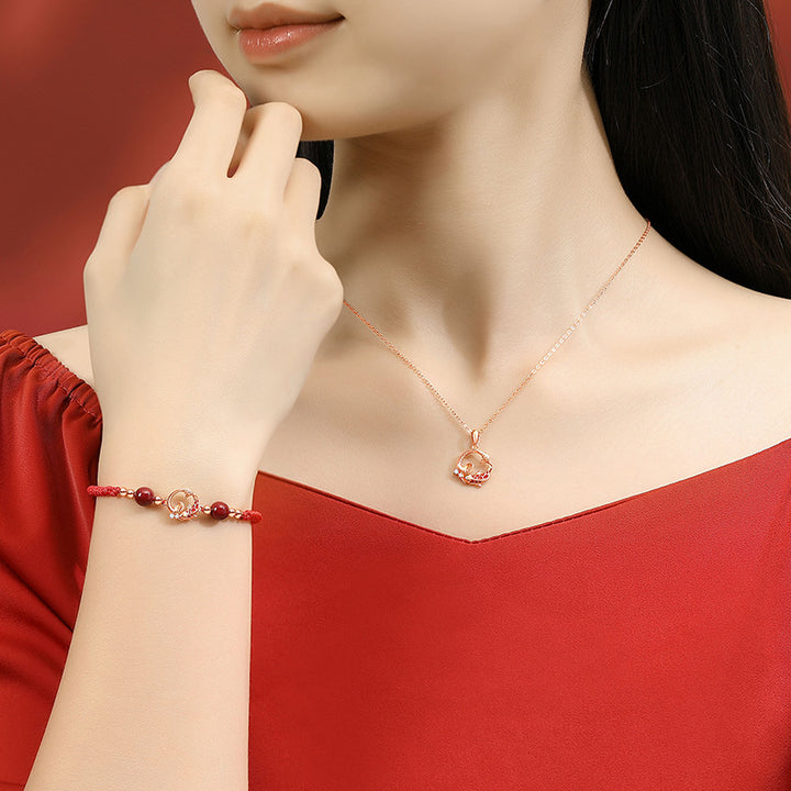 jade and cinnabar year of the snake red string luck bracelet