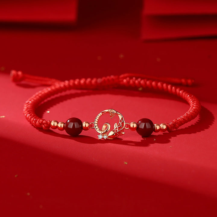 jade and cinnabar year of the snake red string luck bracelet