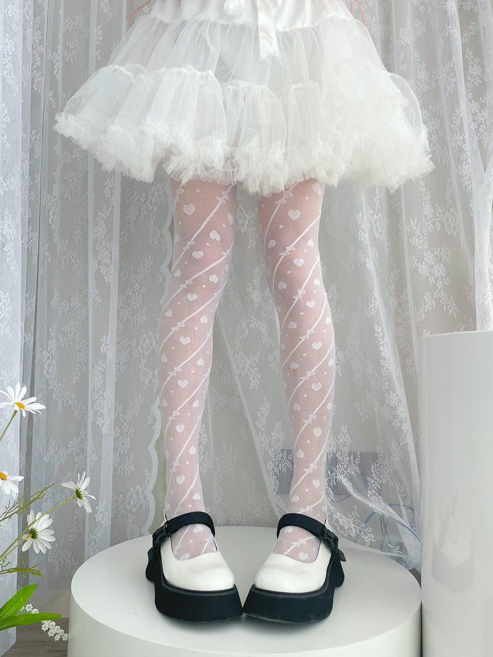 a woman wear lolita style heart pattern white silk pantyhose