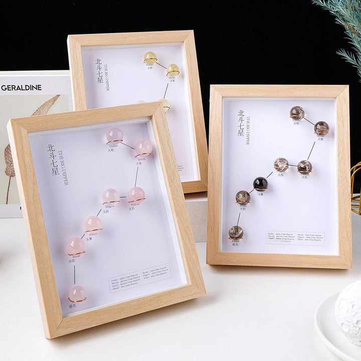 three natural crystal big dipper photo frame display