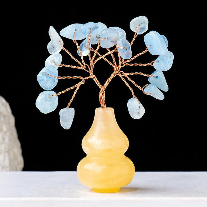 aquamarine crystal bonsai tree with yellow jade gourd base