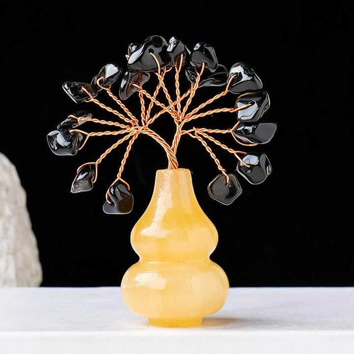 obsidian crystal bonsai tree with yellow jade gourd base