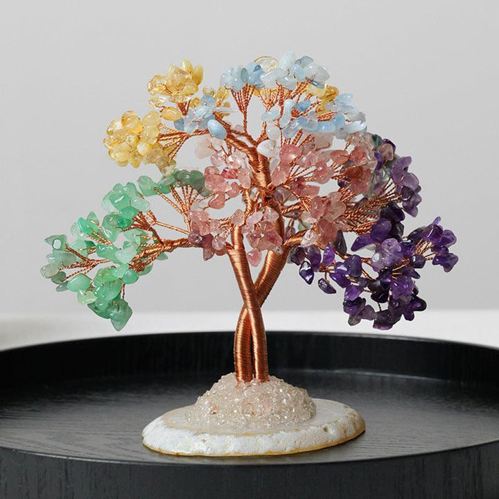 natural rainbow crystal stone wealth tree with agate base on the table