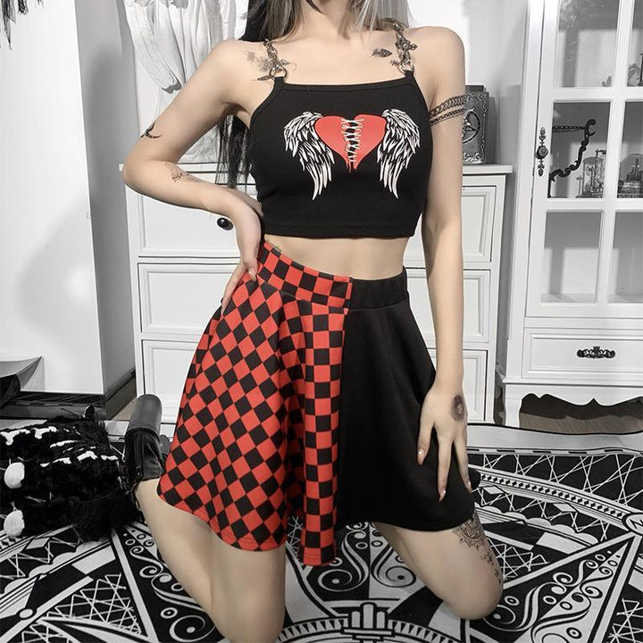 a woman wear a punk gothic black and red check patchwork dress